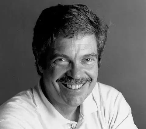 Portrait of Alan Kay during a presentation on personal computing