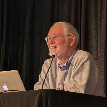 Portrait of Brian Kernighan in a setting evoking Unix, C, and text processing